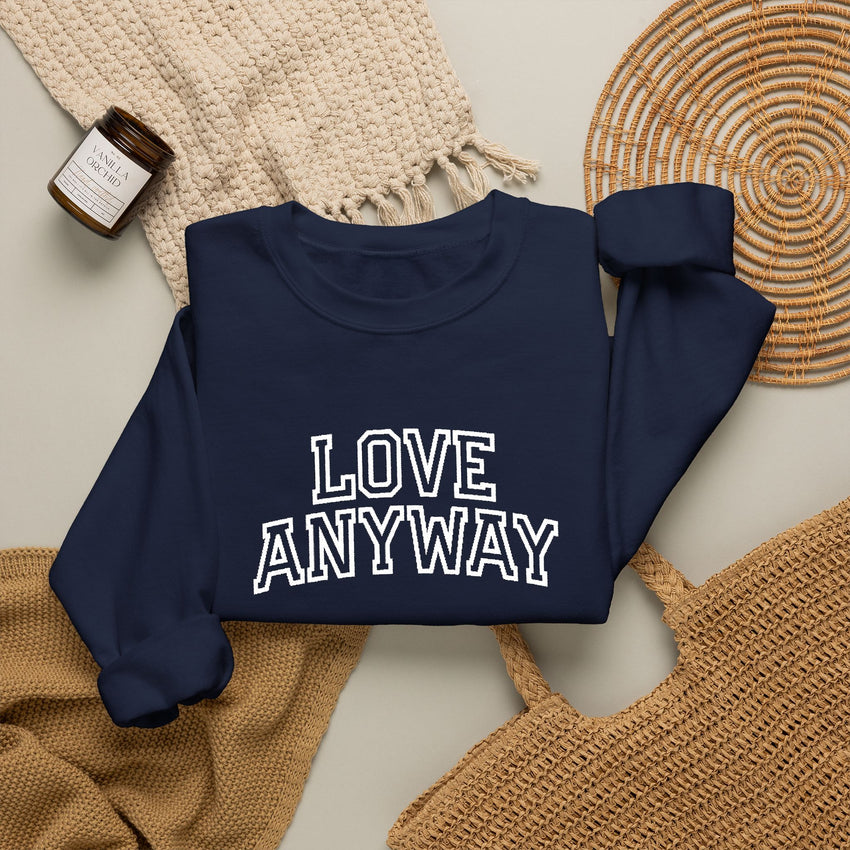"Love Anyway"  Collegiate White Embroidered Unisex Crewneck Sweatshirt