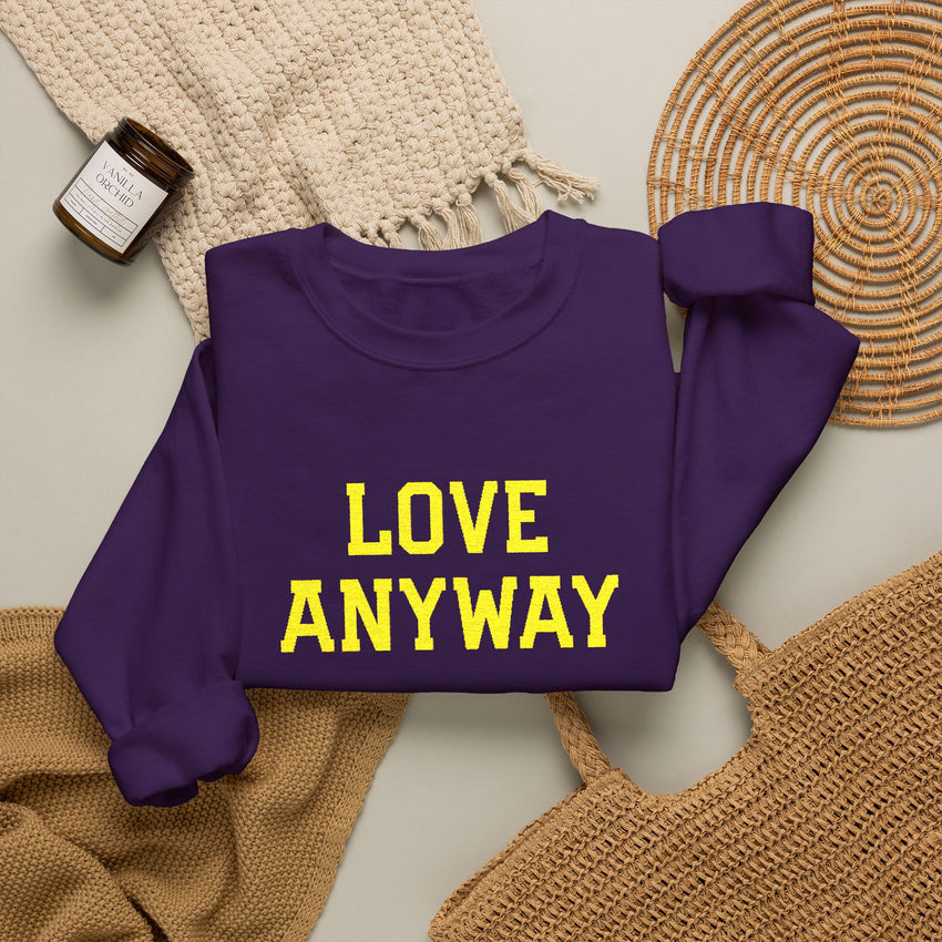 "Love Anyway"  Gold Embroidered Unisex Crewneck Sweatshirt