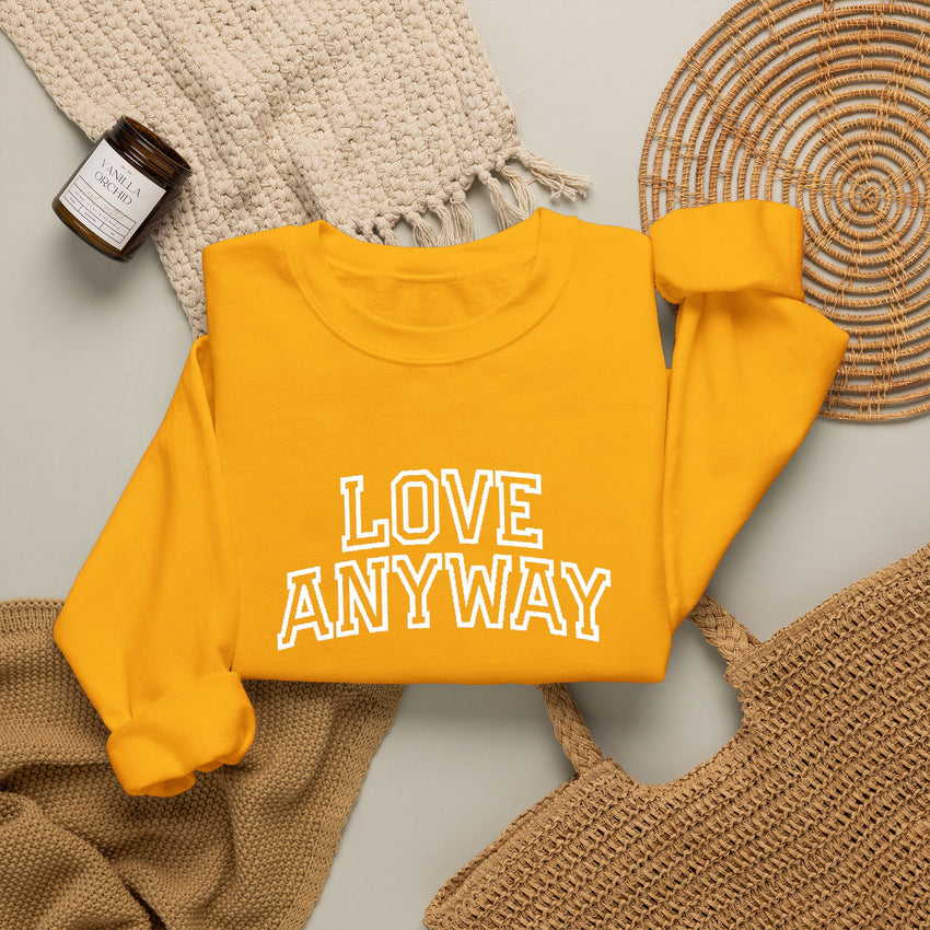 "Love Anyway"  Collegiate White Embroidered Unisex Crewneck Sweatshirt