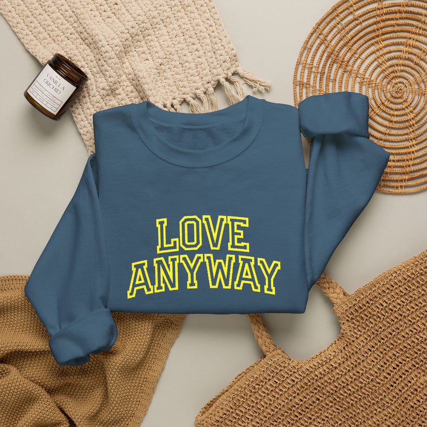 "Love Anyway"  Collegiate Gold Embroidered Unisex Crewneck Sweatshirt