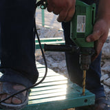 Man working with a drill in Iraq